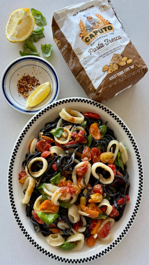 Squid Ink Spaghetti with Calamari, Calabrian Chiles & Tomatoes